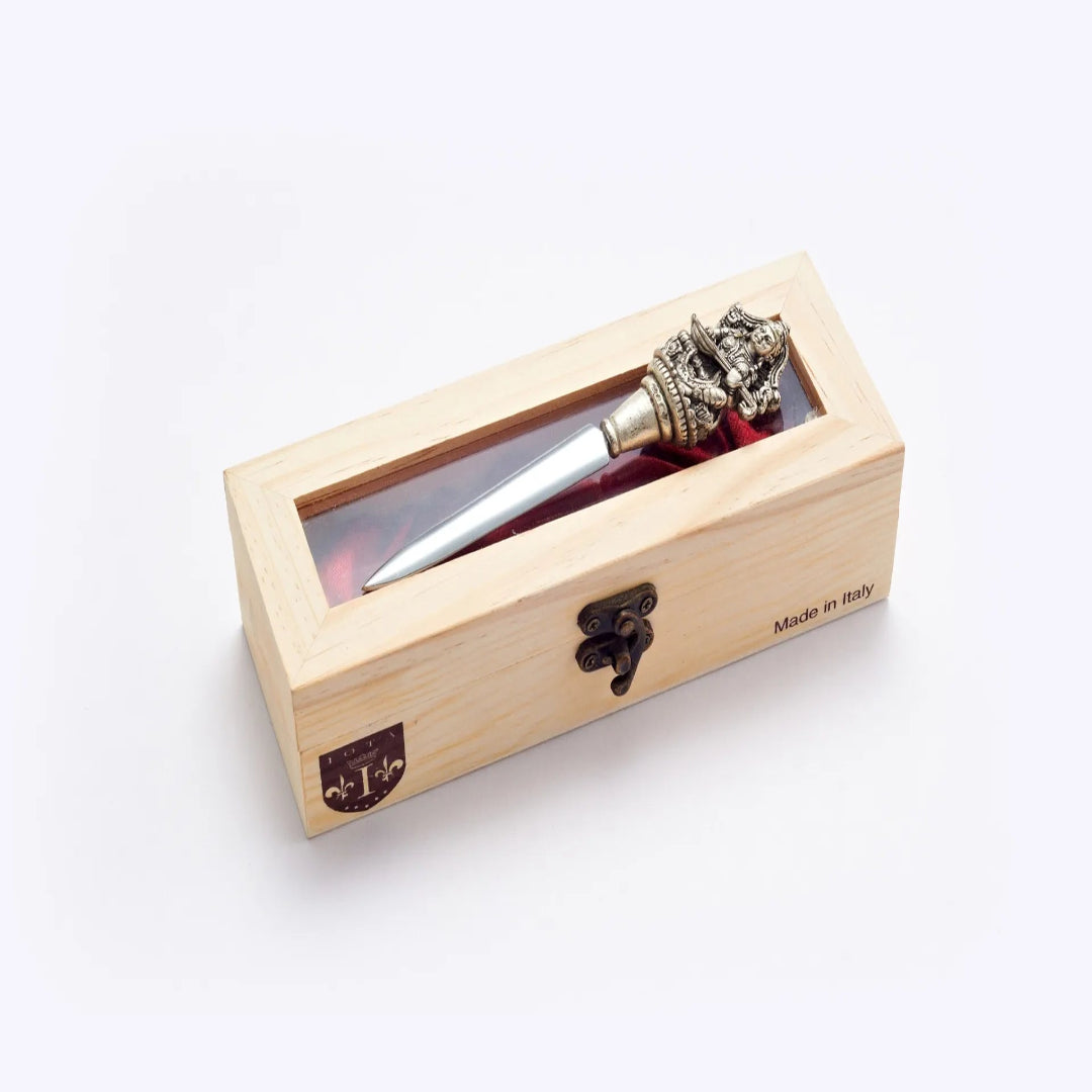 Decorative pen in a wooden box on a white background