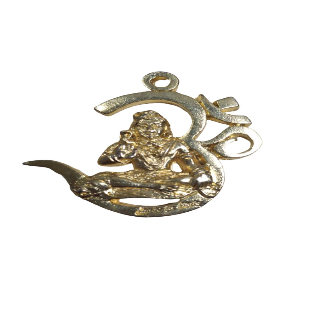 Gold monkey pendant on a wooden surface